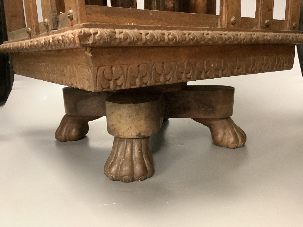 A small Indian rosewood table top revolving bookcase.